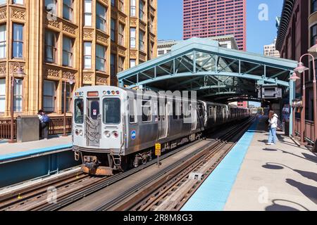 Chicago, United States - May 2, 2023: Chicago 'L' Elevated Metro rapid rail transit train public transport at Library station in Chicago, United State Stock Photo