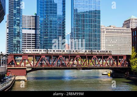 Chicago, United States - May 3, 2023: Chicago 'L' Elevated Metro rapid rail transit train public transport on a bridge in Chicago, United States. Stock Photo