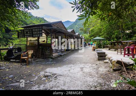 Taroko National Park, Taiwan - May 23, 2023: A rest stop on the Shakadang hiking trail. The protected mountain forest landscape named after the landma Stock Photo