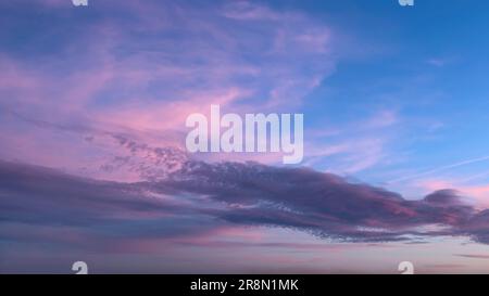 Purple dramatic sunset sky background overlay. Ideal for sky replacement, screen saver or any other application Stock Photo