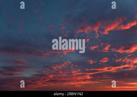 Orange dramatic sunset sky background overlay. Ideal for sky replacement, screen saver or any other application Stock Photo