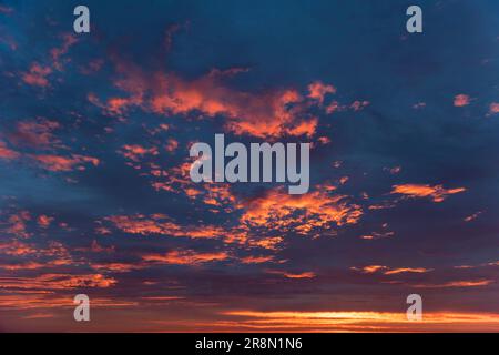 Orange dramatic sunset sky background overlay. Ideal for sky replacement, screen saver or any other application Stock Photo