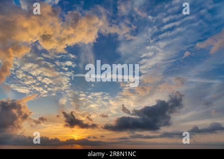 Orange dramatic sunset sky background overlay. Ideal for sky replacement, screen saver or any other application Stock Photo