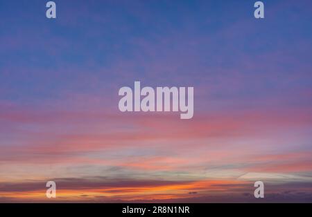 Orange dramatic sunset sky background overlay. Ideal for sky replacement, screen saver or any other application Stock Photo