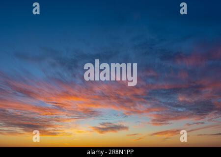 Orange dramatic sunset sky background overlay. Ideal for sky replacement, screen saver or any other application Stock Photo