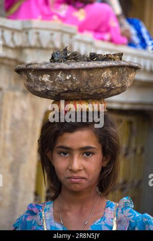 girl with cow on head Stock Photo - Alamy