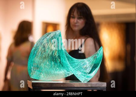 London, UK.  22 June 2023. A visitor passes 'Ku-82 (free Essence-82', 2015, by Niyoko Ikuta on the A Lighthouse called Kanata, Tokyo, stand at the preview of the first Treasure House Fair at the Royal Hospital Chelsea.  The art and antiques fair brings together more than 50 of the best British and international dealers across numerous disciplines and centuries and takes its place in the summer calendar after Masterpiece art fair closed in 2022.  The fair is open to the public 22 to 26 June.  Credit: Stephen Chung / Alamy Live News Stock Photo