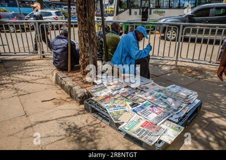 Nairobi, Kenya. 05th June, 2023. A man sells newspapers by the streets in Nairobi. This is a series of life through the busy streets of Nairobi City well known as a City under the sun deprived from the Maasai word Enkare which translates to 'place of cool waters'. Nairobi is the largest and Kenya's capital City. Credit: SOPA Images Limited/Alamy Live News Stock Photo