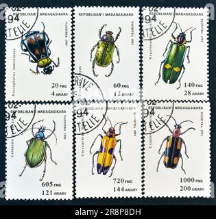 Cancelled postage stamps printed by Madagascar, that show Beetles, circa 1993. Stock Photo