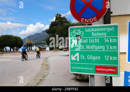 STROBL, AUSTRIA - AUGUST 2, 2022: Cyclists visit Strobl, small resort town on Lake Wolfgangsee in Austria. Strobl is on the route of Salzkammergut Rad Stock Photo