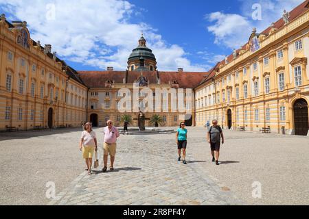 MELK, AUSTRIA - AUGUST 1, 2022: Tourists visit Stift Melk (Melk Abbey) in Wachau region of Austria. The Benedictine abbey is a recognized monument of Stock Photo