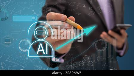 AI, Artificial Intelligence and machine learning, Businessman holds a smart phone with artificial intelligence data to control the robot to work in Stock Photo