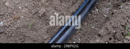 Frame for connecting pipes in trench of ground Stock Photo