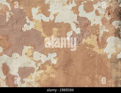 Abstract background.Old painted wall shabby from the time with stains of the remaining paint. Stock Photo