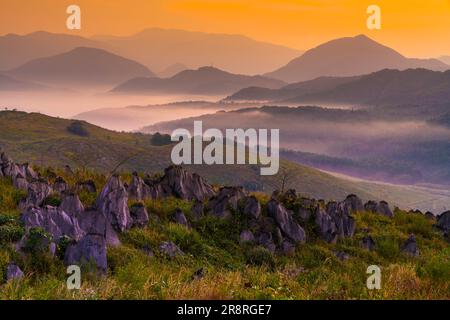 Akiyoshidai and mountain range in the morning Stock Photo