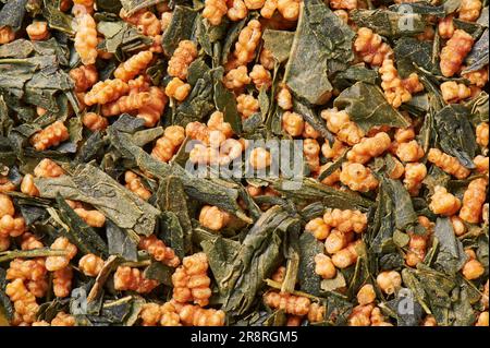 Japanese genmaicha, a mix green tea with roasted rice, macro Stock Photo