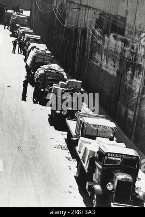 In anticipation of the shipping strike ending these lorries waited to be relieved of their wads at Millers Pond their long wait was in vain. August 23, 1935. Stock Photo