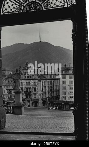 The Einsiedeln Monastery - Switzerland. A view of the town of Einsiedeln from in side the church of the Monastery. December 14, 1950. (Photo by Kosmos Press Bureau (Australia) Pty.Ltd.) Stock Photo