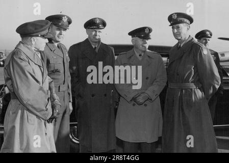 (L to R) Lt. Gen. Doyle O. Hickey, Cofs, Hqs Fed; Lt. Gen Maxwell D. Taylor, Newly Appointed CG, Eighth U S Army; General Otto P. Weyland, CG Feaf; General J. Lawton Collins, Chief of Staff, U S Army; and General Mark A. Clark, Cincfe, Confer Prior to General Collin's Departure from Tokyo international airport, Tokyo, Japan. General Collins Leaves Tokyo for Northern Japan to Continue his tour of the Fec and Korea. January 30, 1953. (Photo by US Army Photo). Stock Photo