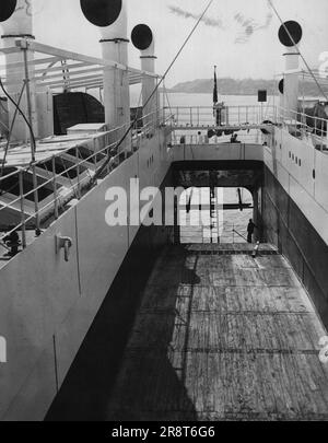 New Port Of Entry For Mr. Whale, In Most Modern Of Whaling Vessels. The Huge Runway in the stern of the Whaling Vessel 'Sir James Clark Ross' through which whales of all sizes and description were jhauled aboard the ship, after being shot or harpooned by one of the ship. After being shot or harpooned by one of the 250 Viking members of the ship's crew. The ross dropped anchor in Quarantine this morning after one of its most successful voyage to arctic waters. April 18, 1931. (Photo by International Newsreel Photos). Stock Photo