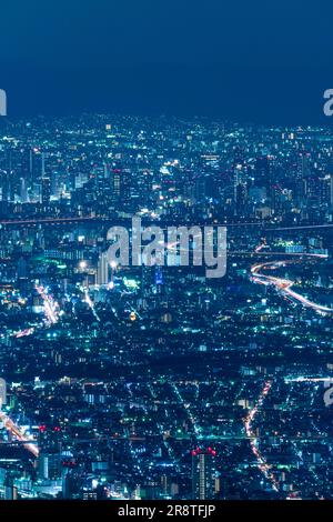 Osaka Castle and Osaka city nightscape viewed from Mount Rokkosan Stock ...