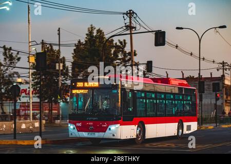 Santiago, Chile -  February 03 2023: A public transport Transantiago, or Red Metropolitana de Movilidad, bus on route. Stock Photo