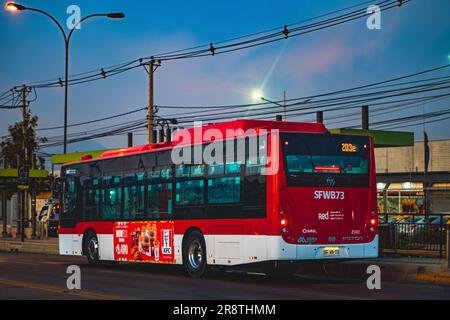 Santiago, Chile -  February 03 2023: A public transport Transantiago, or Red Metropolitana de Movilidad, bus on route. Stock Photo