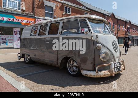A well travelled and rusty Volkswagen camper van. Side view of a ...