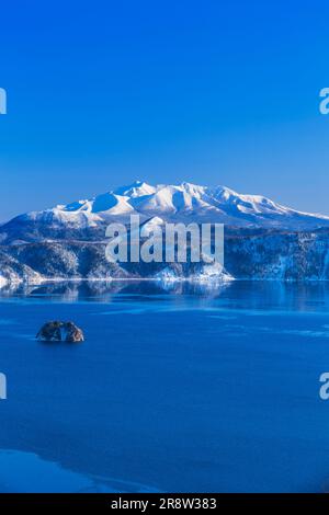 Kamuisshu Island of Lake Mashu and Mount Sharitake Stock Photo