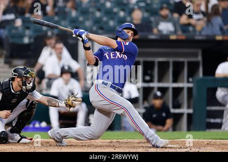 CHICAGO, IL - JUNE 20: Texas Rangers first baseman Nathaniel Lowe (30)  looks on during an MLB game against the Chicago White Sox on June 20, 2023  at Guaranteed Rate Field in