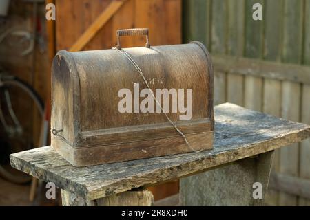 Vintage, old Singer Sewing Machine found in the shed Stock Photo