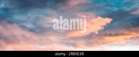 Dramatic colorful sky with clouds in the sunset natural background Stock Photo