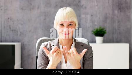 Online Meeting On Computer Using Sign Language Stock Photo