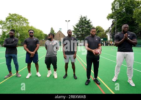 (L-R) Michael Gallup from the NFL team Dallas Cowboys, Josh Uche from the NFL team New England Patriots, Clyde Edwards-Helaire from the NFL team Kansas City Chiefs, Jamel Dean from the NFL team Tampa Bay Buccaneers, Kevin Byard from the NFL team Tennessee Titans and Efe Obada from the NFL team Washington Commanders seen during a visit to Gladesmore Community School, London. Stock Photo