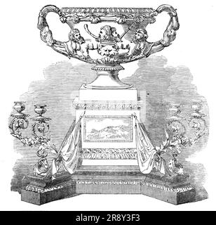 Testimonial presented to Major-General Windham, 1857. 'This superb testimonial to the bravery of &quot;the Hero of the Redan&quot; [from the manufactory of Messrs. Smith and Nicholson] consists of a large gilt silver Warwick vase and pedestal [with]...branches for eight candles and cross standards of the Allied armies. The panels...bear...the General's arms - a bas-relief of the attack on the Redan, and a...bust of the General. The inscription is as follows: To Major-General Charles Aske [sic] Windham, C.B., this Vase is presented as a token of the great respect entertained for him by his frie Stock Photo