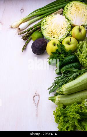 Various green vegetables and fruits Stock Photo