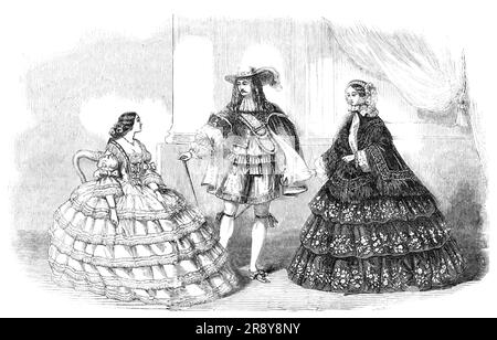 Fashions for February, 1857. '...three figures - two ladies and a gentleman. The costumes of the ladies have been drawn from dresses just completed in the elegant magasin des modes of Madame E. Devy, 73, Lower Grosvenor-street.The ball dress is of white tarlatan, with five flounces, edged with white silk fringe, headed by a row of plaid velvet ribbon. The corsage is of the fashionable square shape, trimmed with ribbon and fringe. The head-dress consists of a lappet of white lace and a cache-peigne bouquet of variegated roses. The out-door dress is of dark lilac taffeta, and has three flounces, Stock Photo