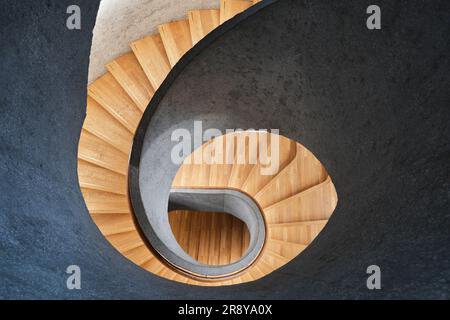 Hong Kong, China - April 2023: Modern staircase, Staircases in reinforced concrete building and wooden floor at Tai Kwun ART Museum Stock Photo
