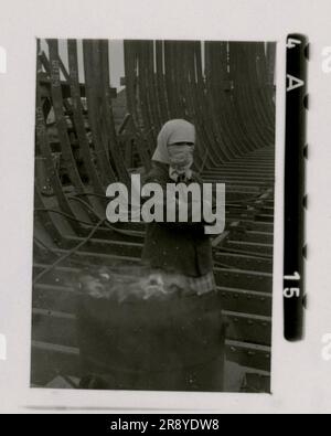 SS photographer Cantzler captured the stark reality of Russia in 1943. The images depict a shipyard, a destroyed factory, a foundry, a schwimmwagen, heavy artillery, panzers accompanied by infantry (including Tiger I tanks and StuGs), a sniper team, and intimate soldier portrait shots Stock Photo