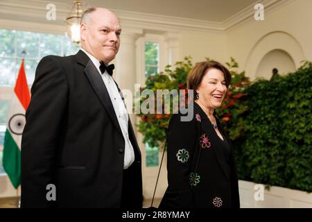 Washington, United States. 22nd June, 2023. Senator Amy Klobuchar, right, a Democrat from Minnesota, and John Bessler, arrive to attend a state dinner in honor of Indian Prime Minister Narendra Modi hosted by US President Joe Biden and First Lady Jill Biden at the White House in Washington, DC on Thursday, June 22, 2023. Biden and Modi announced a series of defense and commercial deals designed to improve military and economic ties between their nations during a state visit at the White House today. Photo by Ting Shen/UPI Credit: UPI/Alamy Live News Stock Photo