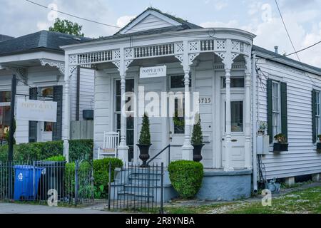 NEW ORLEANS, LA, USA - JUNE 18, 2023: Front of Poppy and Ivy Face Bar on Magazine Street Stock Photo