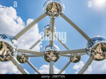 Brussels, Belgium - June, 15, 2023:  The Atomium of Brussels, a modernist building that represents a silver atom model. Originally constructed as the Stock Photo