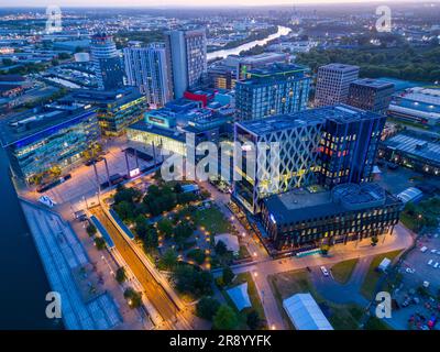 Aerial view of BBC Media City at dusk, night, Salford Quays, Manchester, England Stock Photo
