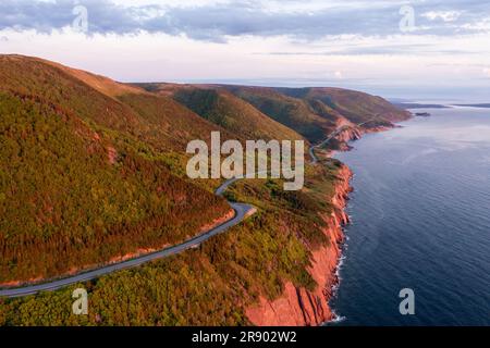 The Cabot Trail in golden light on Cape Breton Island, Nova Scotia Stock Photo