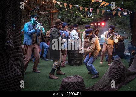 Old Time Sailors performing at Trebah Garden Amphitheatre in Cornwall in the UK. Stock Photo