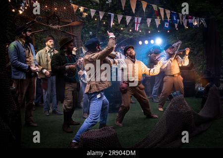 Old Time Sailors performing at Trebah Garden Amphitheatre in Cornwall in the UK. Stock Photo