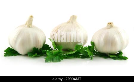 Garlic Vegetable with Green Parsley Leaves Isolated on White Background Stock Photo