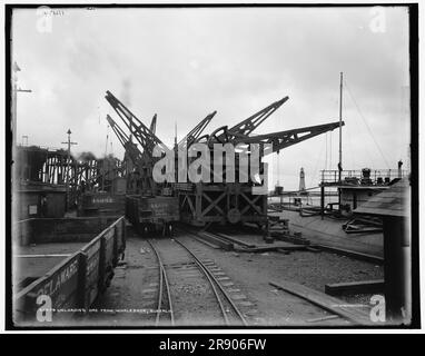 Unloading ore from whaleback, Buffalo, c1900. Stock Photo