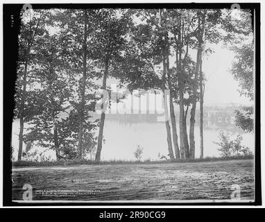 A glimpse of Mirror Lake, Adirondack Mountains, c1902. Stock Photo