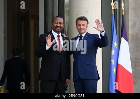 Paris, France. 23rd June, 2023. French President Emmanuel Macron greets Abiy Ahmed, Prime Minister of the Federal Democratic Republic of Ethiopia at the Elysee Palace, on the sidelines of the New Global Financial Pact Summit, in Paris, on June 23, 2023. Dozens of global leaders are gathering in Paris on June 23 for a summit to tease out a new consensus on international economic reforms to help debt-burdened developing countries face a growing onslaught of challenges, particularly climate change. Photo by Tomas Stevens/ABACAPRESS.COM Credit: Abaca Press/Alamy Live News Stock Photo